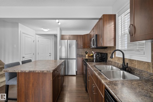 #10 85 Spruce Village Dr Dr, Spruce Grove, AB - Indoor Photo Showing Kitchen With Stainless Steel Kitchen With Double Sink
