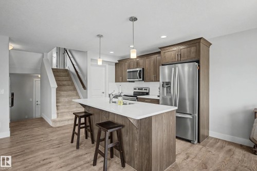 924 Morris Way, Leduc, AB - Indoor Photo Showing Kitchen With Upgraded Kitchen