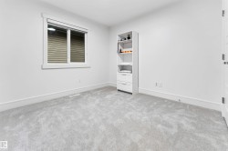 Neutral-toned carpeting paired with crisp white walls - 