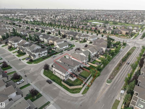 Corner lot property with a fenced backyard and a paved driveway - 6727 20 Ave Sw, Edmonton, AB - Other