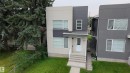 Contemporary facade featuring light and dark gray siding - 9311 66 Avenue Nw, Edmonton, AB  - Outdoor 