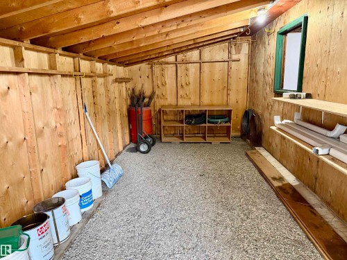 Interior Wood burning Stove - 54046 Rge Road 213, Rural Strathcona County, AB - Indoor Photo Showing Basement