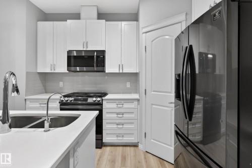 17928 62 Street Nw, Edmonton, AB - Indoor Photo Showing Kitchen With Double Sink With Upgraded Kitchen