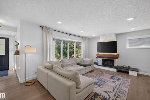 14447 107A Avenue Nw, Edmonton, AB - Indoor Photo Showing Living Room With Fireplace
