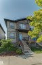 Two-story townhouse with stone and siding exterior - #8 1703 16 Av Nw Nw, Edmonton, AB  - Outdoor 