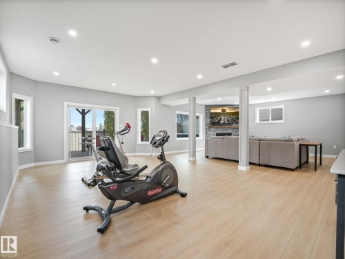 4115 58 Street, Beaumont, AB - Indoor Photo Showing Gym Room