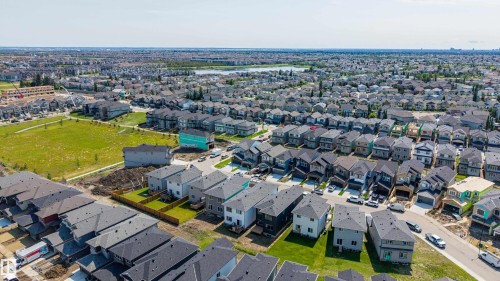 Aerial perspective showcasing a residential neighborhood with varied architectural styles - 8728 182 Avenue Nw, Edmonton, AB - Outdoor With View