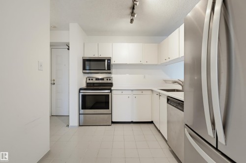 #502 10545 Saskatchewan Dr Nw, Edmonton, AB - Indoor Photo Showing Kitchen With Stainless Steel Kitchen