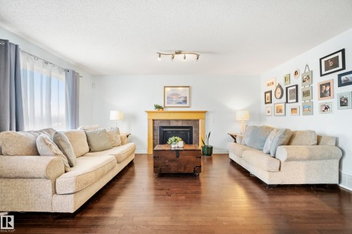 1212 37C Avenue Nw, Edmonton, AB - Indoor Photo Showing Living Room With Fireplace