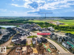 Aerial view showcasing a developing residential area with numerous modern homes - 