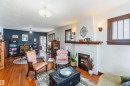 11343 96 Street Nw, Edmonton, AB  - Indoor Photo Showing Living Room With Fireplace 