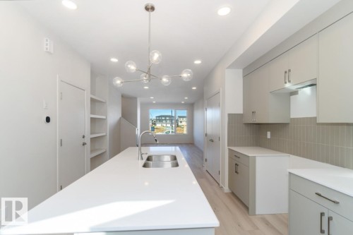89 Gambel Loop, Spruce Grove, AB - Indoor Photo Showing Kitchen With Double Sink