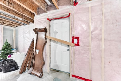 Unfinished basement space featuring exposed wood joists and concrete flooring - 2923 16 Street Nw, Edmonton, AB - Indoor Photo Showing Basement