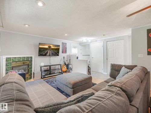 3527 41 Avenue Nw, Edmonton, AB - Indoor Photo Showing Living Room With Fireplace