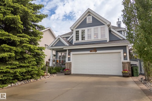 Two-story residence featuring blue siding and white trim - 416 Sparling Crest Sw, Edmonton, AB - Outdoor With Facade