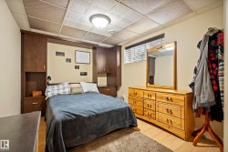 Built-in dark wood cabinetry with integrated shelving and drawers - 