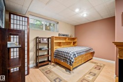 Light-toned wood-finish flooring complements a neutral wall color - 