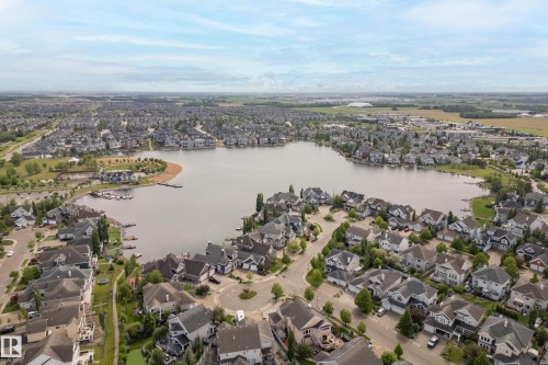 Expansive residential development featuring a central lake - 416 Sparling Crest Sw, Edmonton, AB - Outdoor With Body Of Water With View