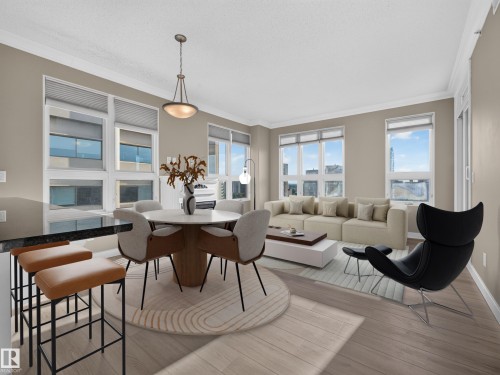 Open-concept living space featuring wood-finish flooring, multiple large windows, and a dining area with a pendant light fixture - #1208 9939 109 St Nw, Edmonton, AB - Indoor