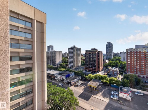 Expansive city vista featuring a high-rise building with horizontal window bands - #1208 9939 109 St Nw, Edmonton, AB - Outdoor