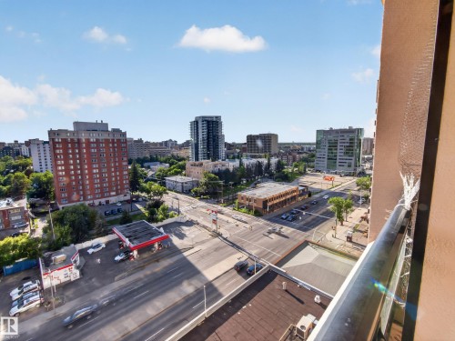 Cityscape panorama featuring diverse urban architecture, multiple streets, and commercial establishments - #1208 9939 109 St Nw, Edmonton, AB - Outdoor With View