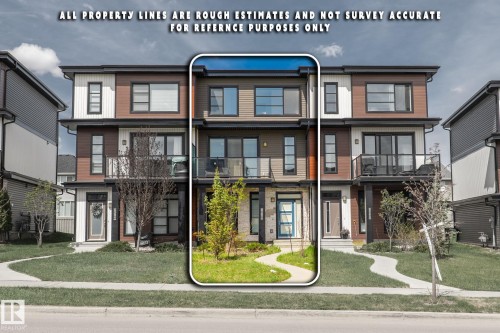 Modern three-story townhouse featuring a multi-textured facade with wood-look siding and white trim - 8282 Chappelle Way Sw, Edmonton, AB - Outdoor With Facade