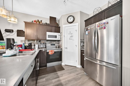 689 Black Boulevard, Leduc, AB - Indoor Photo Showing Kitchen With Double Sink