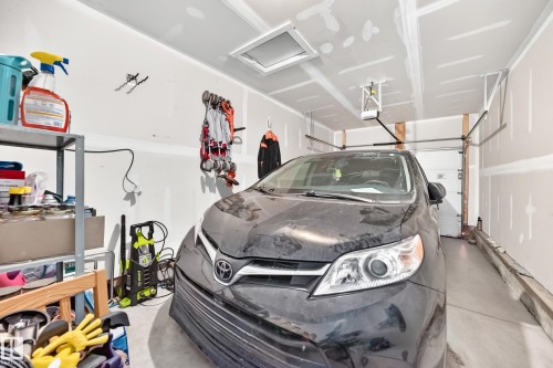 689 Black Boulevard, Leduc, AB - Indoor Photo Showing Garage