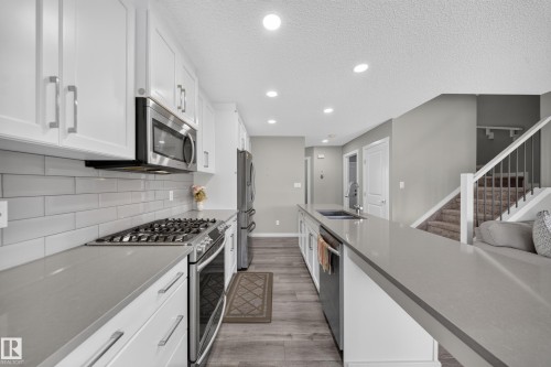 2366 Wonnacott Crescent Sw, Edmonton, AB - Indoor Photo Showing Kitchen With Double Sink With Upgraded Kitchen