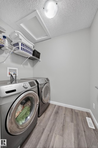 2366 Wonnacott Crescent Sw, Edmonton, AB - Indoor Photo Showing Laundry Room