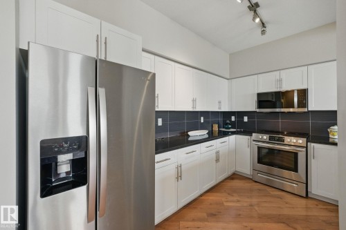 #2701 10136 104 St Nw, Edmonton, AB - Indoor Photo Showing Kitchen With Stainless Steel Kitchen With Upgraded Kitchen