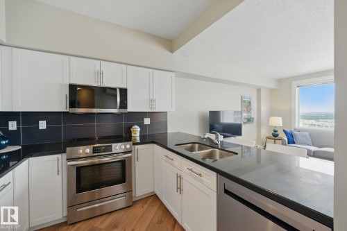 #2701 10136 104 St Nw, Edmonton, AB - Indoor Photo Showing Kitchen With Stainless Steel Kitchen With Double Sink With Upgraded Kitchen