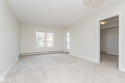 Light-colored wall-to-wall carpeting throughout - 