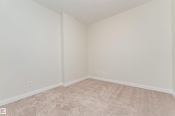 Neutral-toned carpeting paired with light-colored walls - 