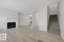 10473 24 Avenue Nw, Edmonton, AB  - Indoor Photo Showing Living Room With Fireplace 