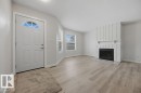 10473 24 Avenue Nw, Edmonton, AB  - Indoor Photo Showing Living Room With Fireplace 