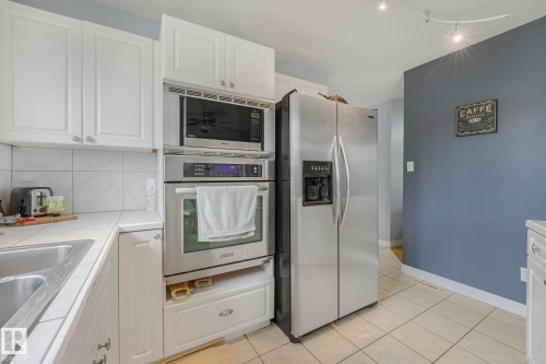8712 137 Avenue Nw, Edmonton, AB - Indoor Photo Showing Kitchen With Double Sink