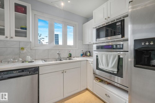 8712 137 Avenue Nw, Edmonton, AB - Indoor Photo Showing Kitchen With Double Sink