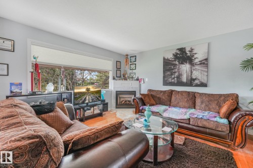 8712 137 Avenue Nw, Edmonton, AB - Indoor Photo Showing Living Room With Fireplace