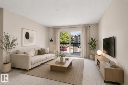 Living area featuring light-toned walls, plush carpet flooring, and a sliding glass door opening to a private balcony - 
