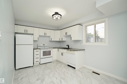 1679 Lakewood Road Nw, Edmonton, AB - Indoor Photo Showing Kitchen