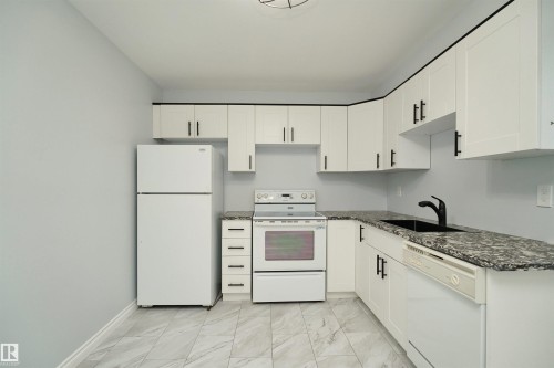 1679 Lakewood Road Nw, Edmonton, AB - Indoor Photo Showing Kitchen