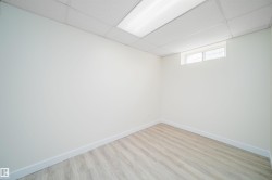 Neutral wall tones with wood-finish flooring - 