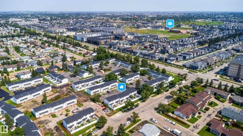 Aerial perspective showcasing residential developments with varied architectural styles - 11432 139 Avenue Nw, Edmonton, AB - Outdoor With View