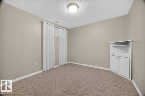 #52 1780 Glastonbury Bv Nw, Edmonton, AB - Indoor Photo Showing Other Room