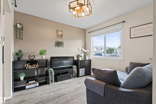 #64 3221 119 St Nw, Edmonton, AB - Indoor Photo Showing Other Room With Fireplace