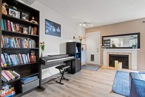 #64 3221 119 St Nw, Edmonton, AB - Indoor Photo Showing Office With Fireplace