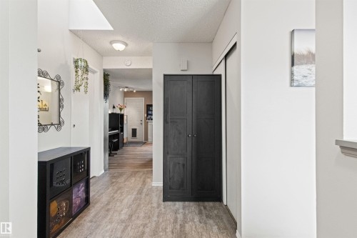 #64 3221 119 St Nw, Edmonton, AB - Indoor Photo Showing Other Room With Fireplace