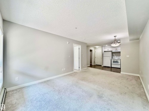 #111 11511 27 Av Nw, Edmonton, AB - Indoor Photo Showing Other Room