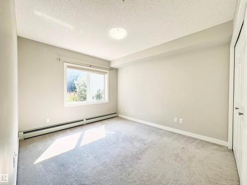 #111 11511 27 Av Nw, Edmonton, AB - Indoor Photo Showing Other Room